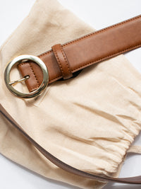 Cinturón circular de 4 cm.